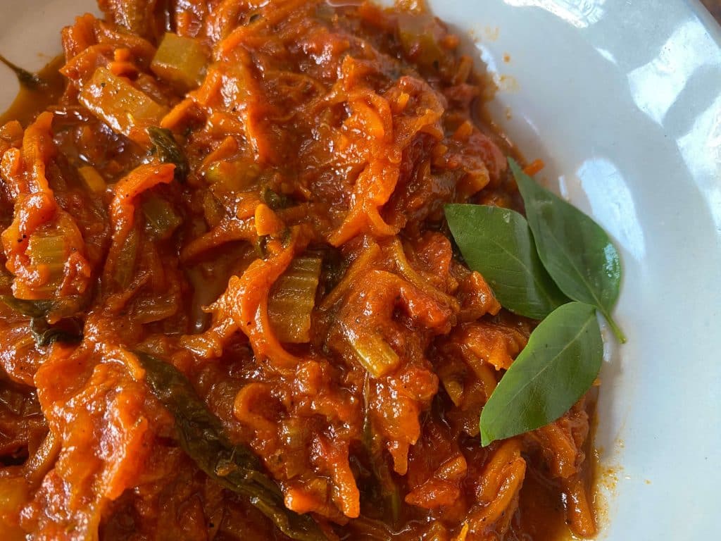 Red sauce with vegetables.